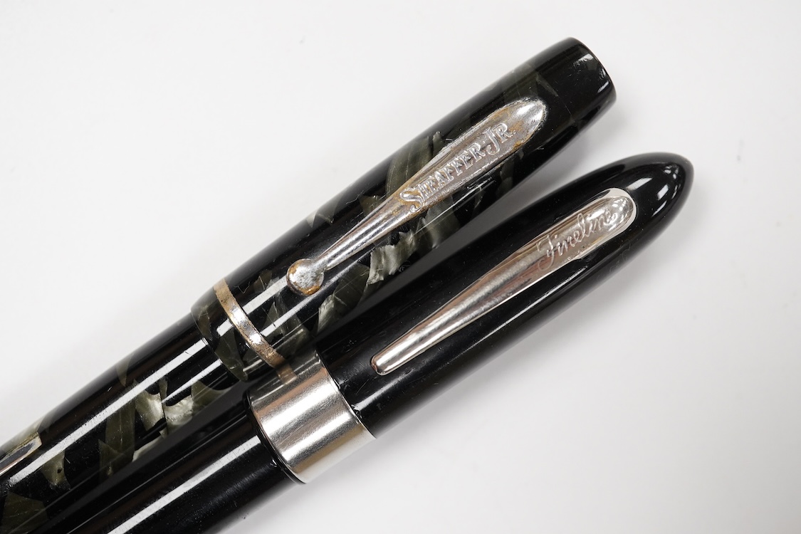 A pair of Sheaffer lever filled pens with nickel trim